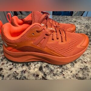 North Face women’s running shoes size 8. Burnt orange color.